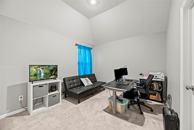 home office with carpet and vaulted ceiling