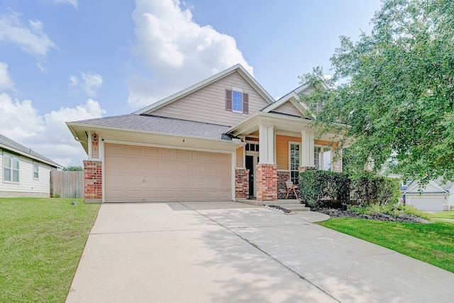 view of front facade featuring a garage and a front lawn