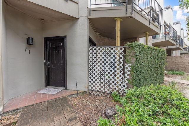 property entrance with a balcony