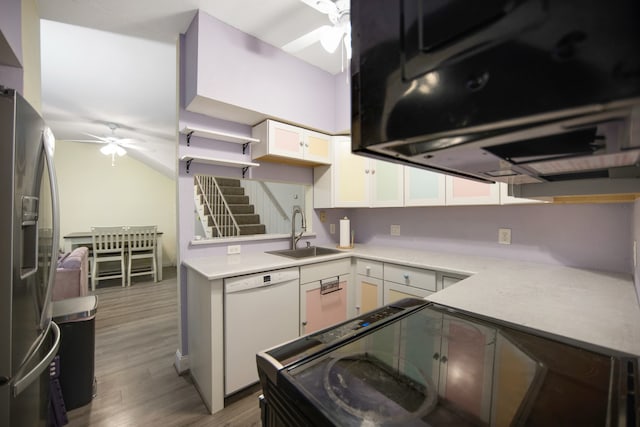 kitchen featuring white dishwasher, ceiling fan, stainless steel fridge with ice dispenser, and white cabinetry