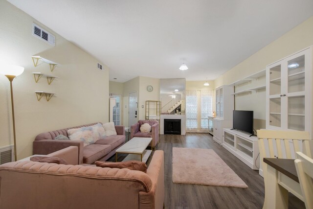 living room with dark hardwood / wood-style floors