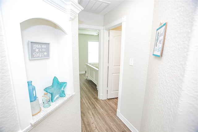 corridor featuring light hardwood / wood-style floors