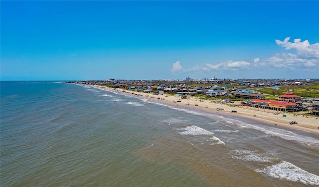 bird's eye view with a beach view and a water view