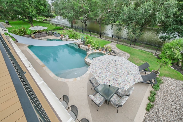 view of pool featuring a yard, an in ground hot tub, and a patio