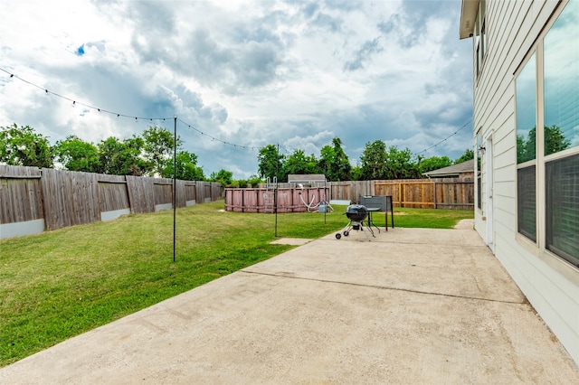 view of patio / terrace with a pool