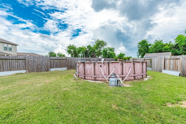 16555 Mandate Dr, Houston, TX 77049 - view of yard featuring a fenced backyard and a fenced in pool