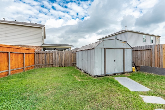 view of outbuilding featuring a lawn