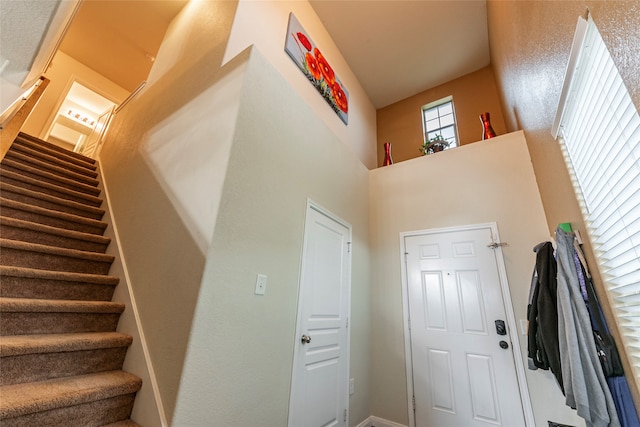 stairs with a towering ceiling