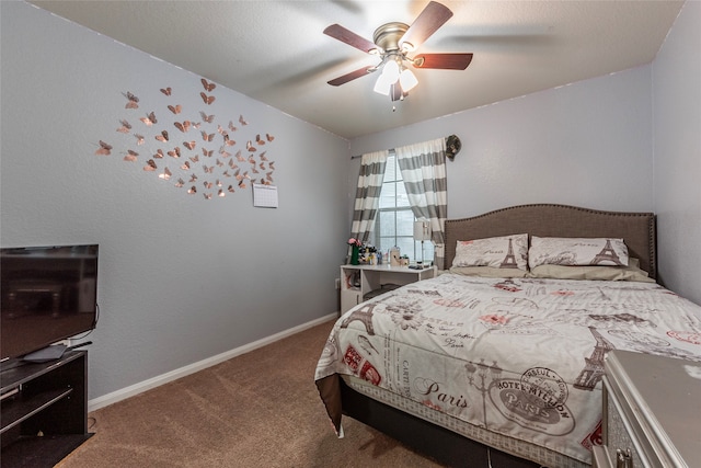 carpeted bedroom featuring vaulted ceiling and ceiling fan