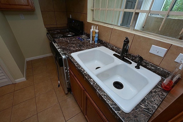 bathroom featuring vanity and tile patterned flooring