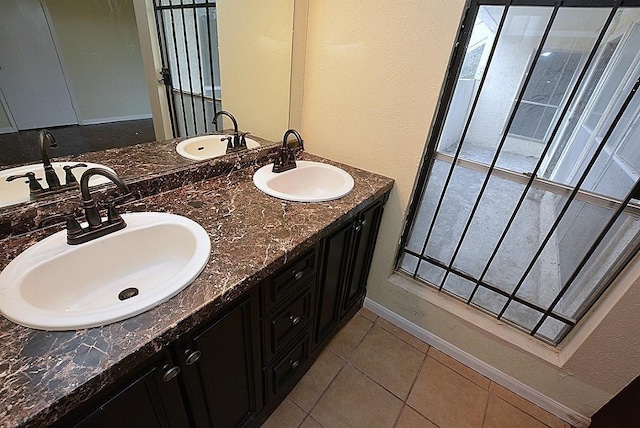 bathroom featuring vanity and tile patterned floors