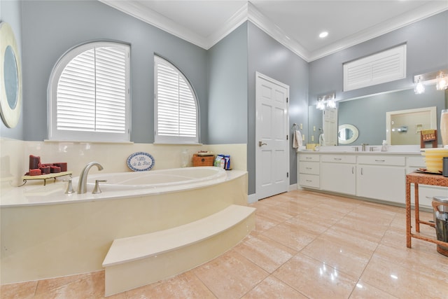 bathroom with a tub, tile patterned floors, crown molding, and vanity