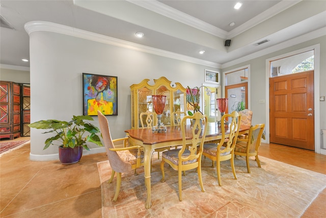 dining space featuring ornamental molding