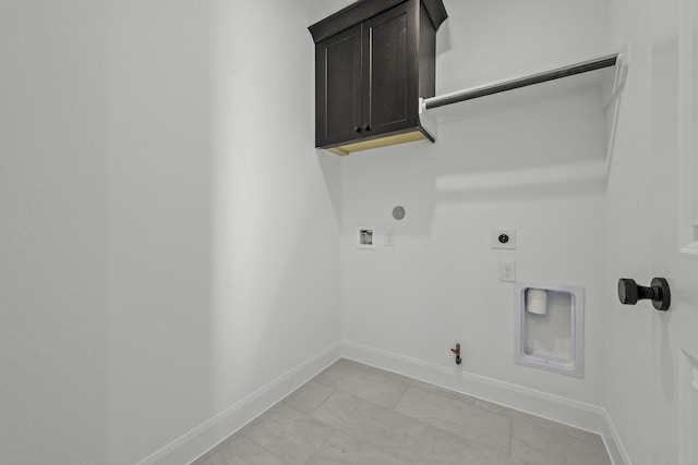 laundry area featuring gas dryer hookup, cabinets, hookup for a washing machine, and electric dryer hookup