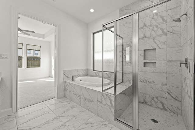 bathroom featuring separate shower and tub and ceiling fan