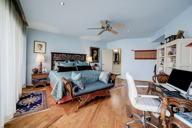 bedroom with ceiling fan and hardwood / wood-style floors