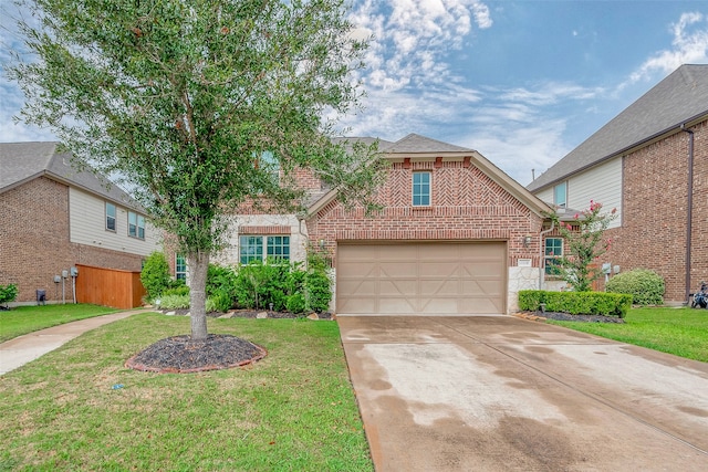 view of property with a garage and a front lawn