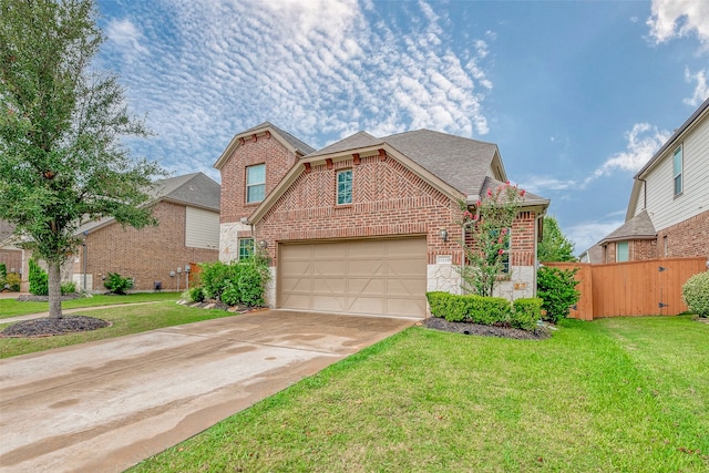 view of front of home with a garage and a front lawn