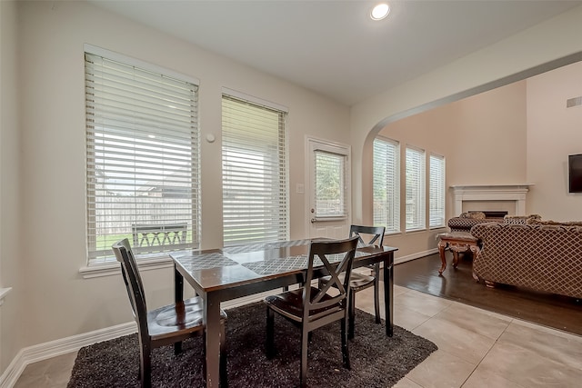 dining space featuring plenty of natural light and light wood-type flooring