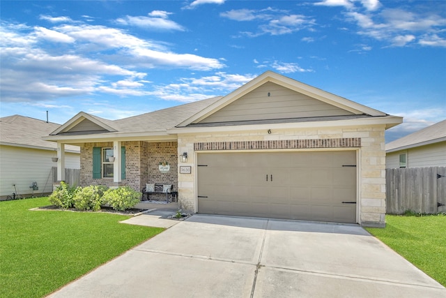 ranch-style house featuring a garage and a front lawn