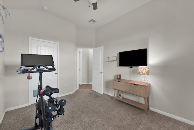 exercise area featuring lofted ceiling, carpet flooring, and ceiling fan