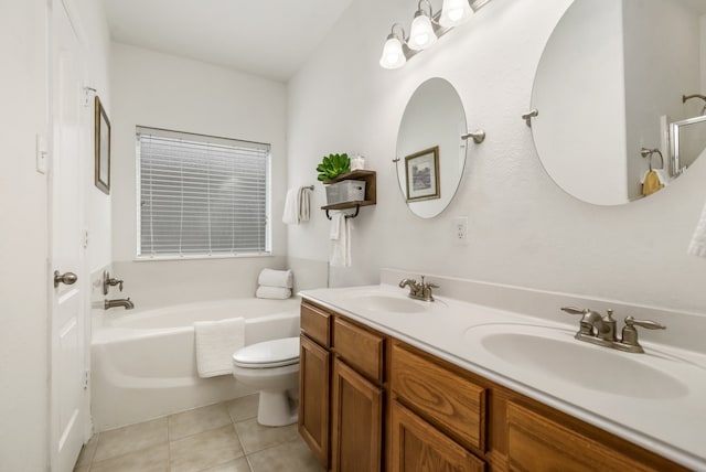 bathroom with tile patterned flooring, a bathing tub, toilet, and vanity