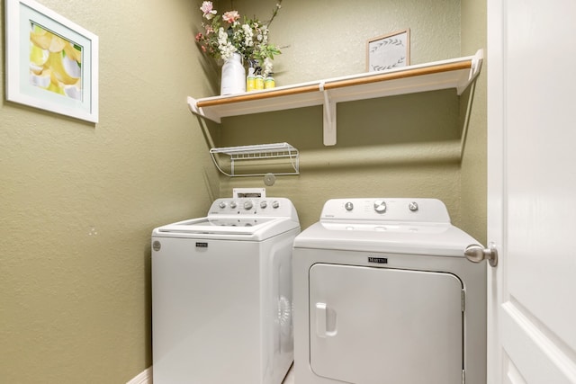 laundry room featuring washer and dryer