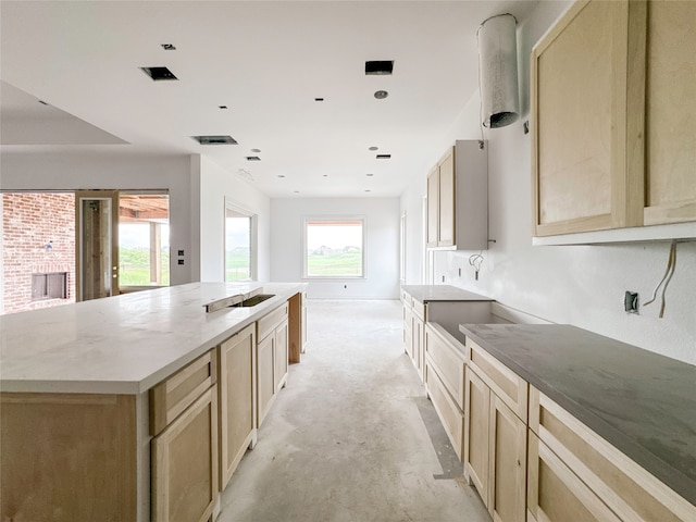 kitchen featuring a kitchen island and a fireplace