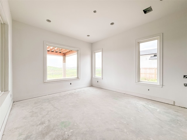 empty room featuring a wealth of natural light