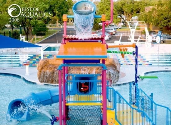 view of swimming pool with a playground