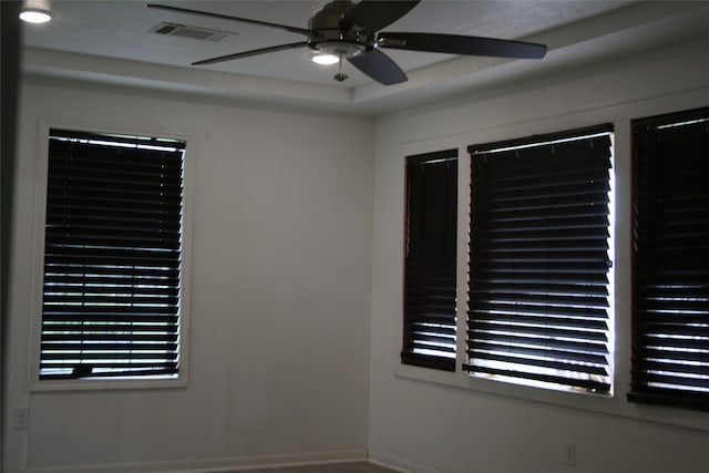 spare room with ceiling fan