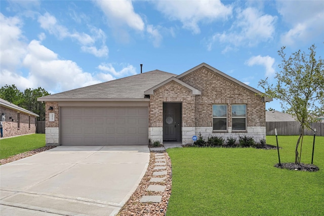 single story home featuring a garage and a front yard