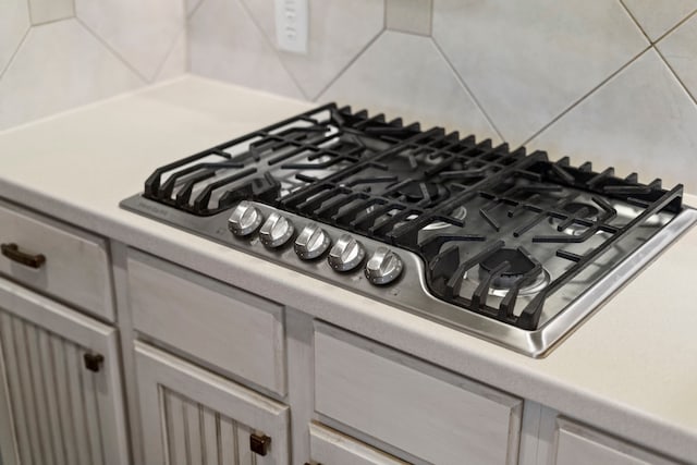 interior details with stainless steel gas stovetop