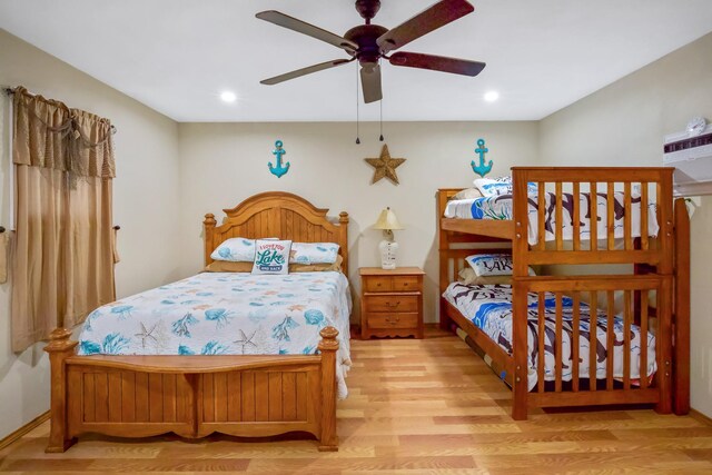 bedroom featuring ceiling fan and light wood-type flooring