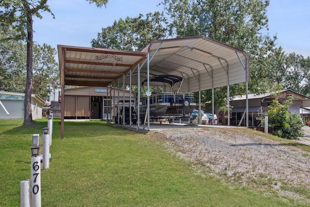 exterior space with a lawn and a carport