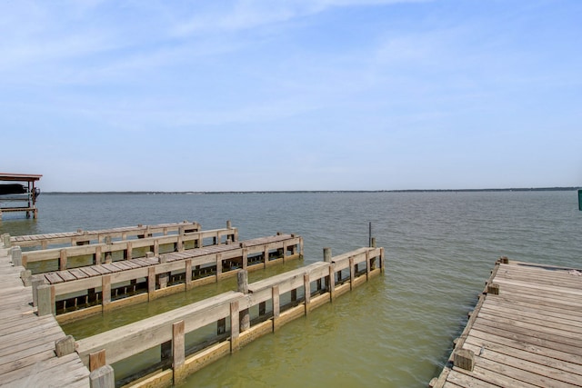 view of dock with a water view