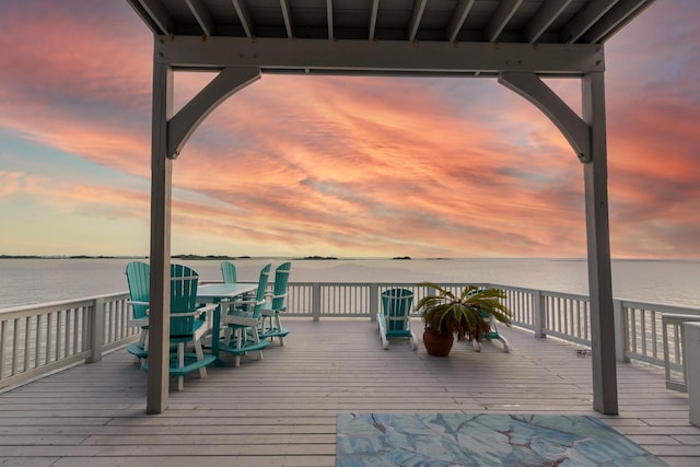 deck at dusk with a water view