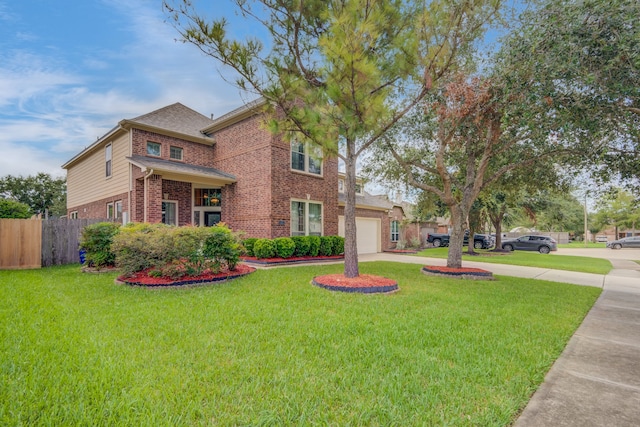 view of front of home featuring a garage and a front lawn