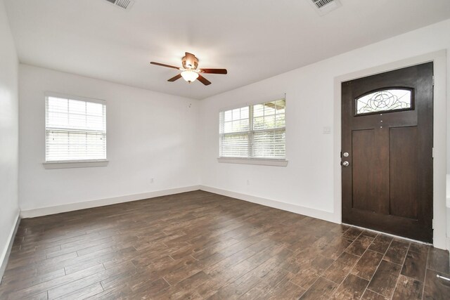 foyer with ceiling fan and dark hardwood / wood-style flooring