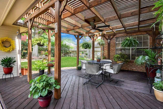 wooden terrace featuring a pergola and ceiling fan