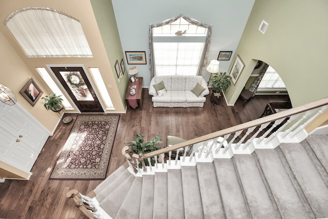 foyer entrance featuring hardwood / wood-style flooring and plenty of natural light