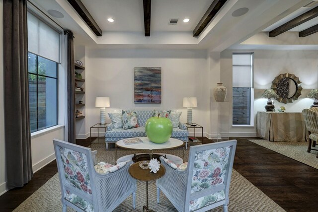 interior space featuring dark wood-type flooring and beamed ceiling