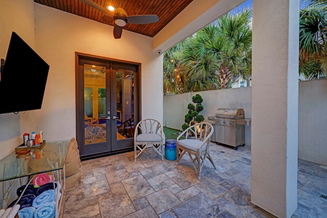 view of patio with a grill, ceiling fan, and french doors