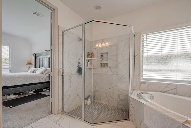 ensuite bathroom with marble finish floor, a marble finish shower, visible vents, ensuite bath, and a bath