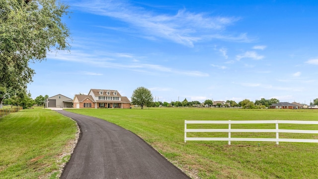 view of street featuring a rural view and driveway