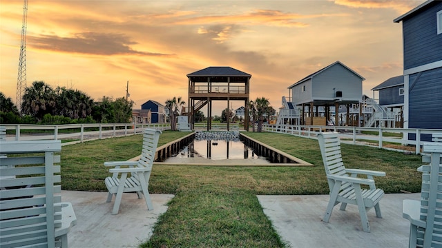 surrounding community with a yard, a patio, and a gazebo