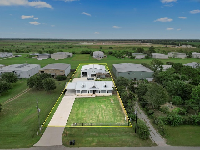 birds eye view of property featuring a rural view