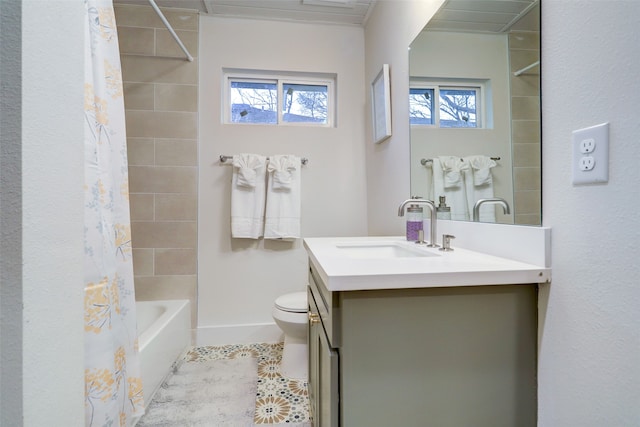 full bathroom featuring tile patterned flooring, vanity, toilet, and shower / bathtub combination with curtain