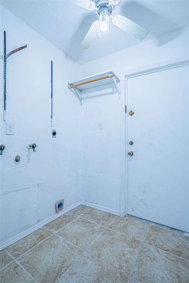 laundry area with tile patterned floors, a textured ceiling, ceiling fan, and hookup for an electric dryer