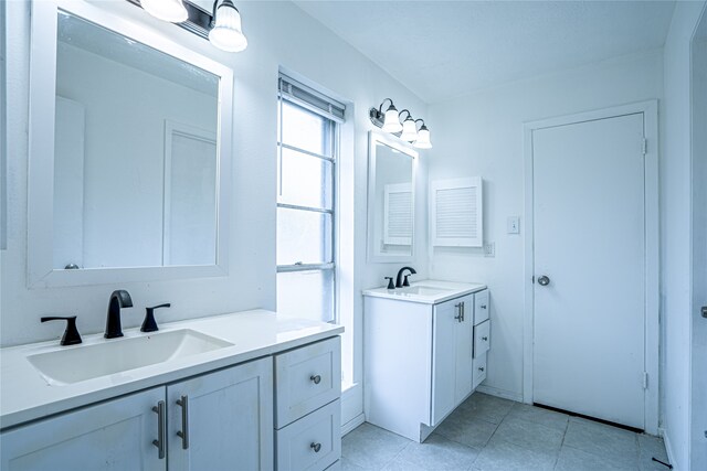 bathroom featuring vanity and tile patterned flooring